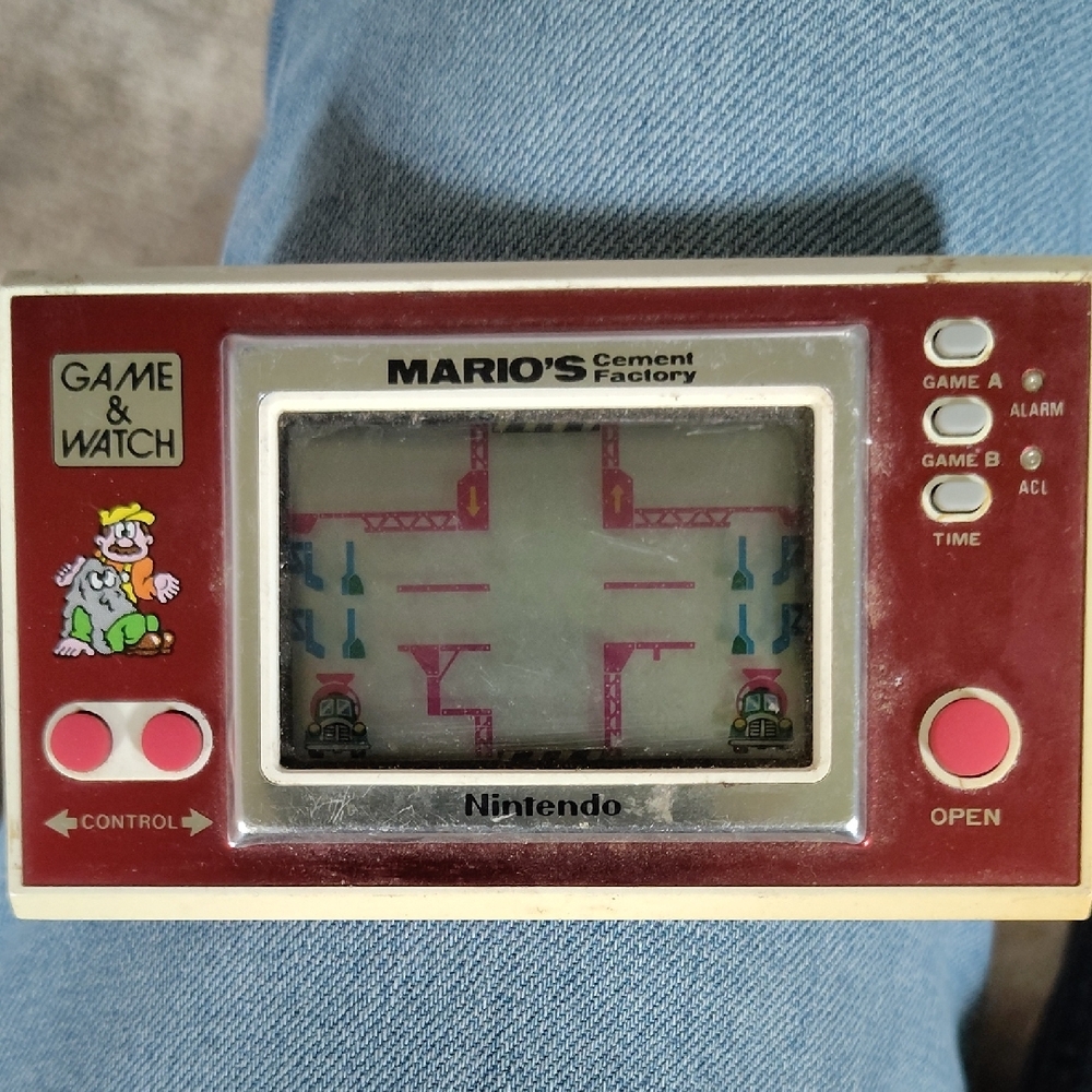 Nintendo Red and White Handheld Console